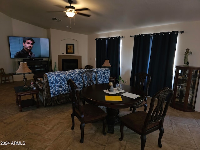 dining space featuring ceiling fan