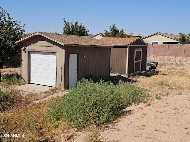 garage with wood walls