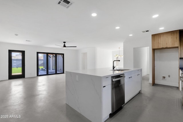 kitchen featuring a sink, visible vents, modern cabinets, and dishwasher