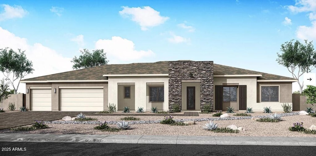 prairie-style home with stone siding, a garage, stucco siding, a shingled roof, and driveway