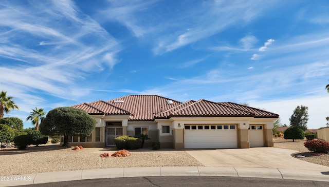 view of front of home with a garage