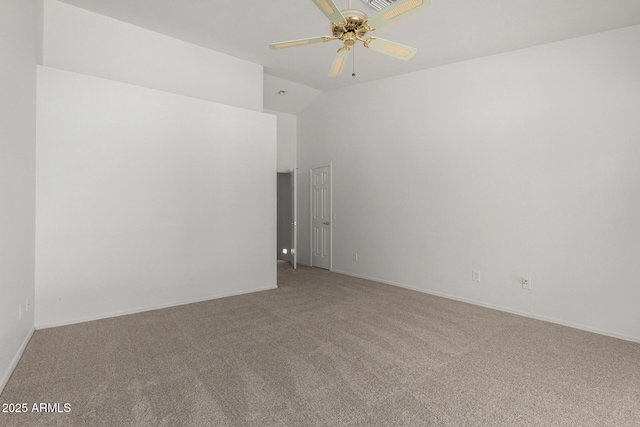 spare room with carpet floors, baseboards, and a ceiling fan