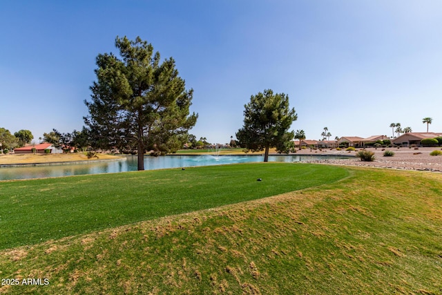 view of yard with a water view