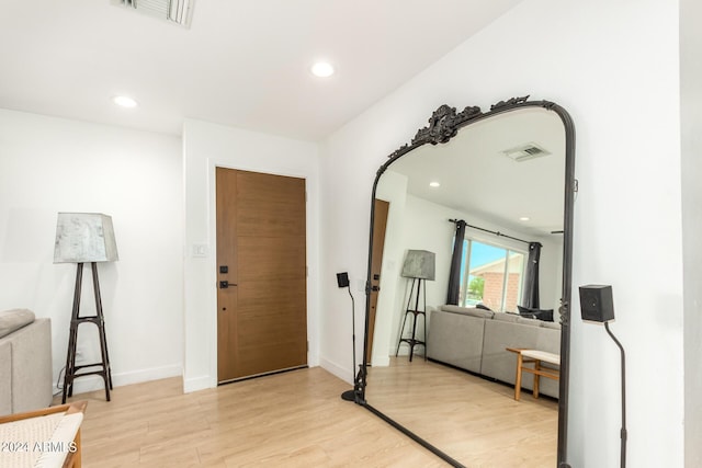 foyer entrance featuring light hardwood / wood-style floors