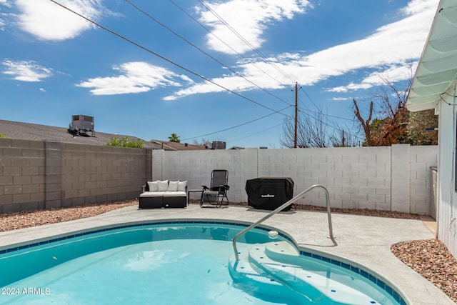 view of swimming pool with central AC