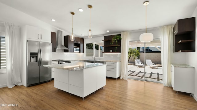 6833 E Grandview Dr, Scottsdale, AZ 85254 - kitchen with wall chimney range hood, white cabinetry, open shelves, light wood-style floors, and stainless steel appliances