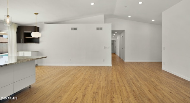 6833 E Grandview Dr, Scottsdale, AZ 85254 - unfurnished living room featuring light wood finished floors, visible vents, recessed lighting, and lofted ceiling