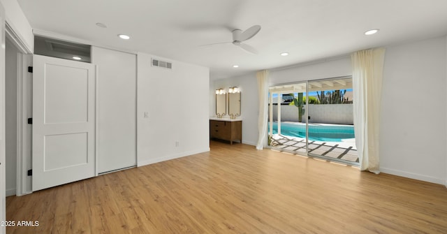 6833 E Grandview Dr, Scottsdale, AZ 85254 - unfurnished bedroom featuring baseboards, recessed lighting, visible vents, access to exterior, and wood finished floors