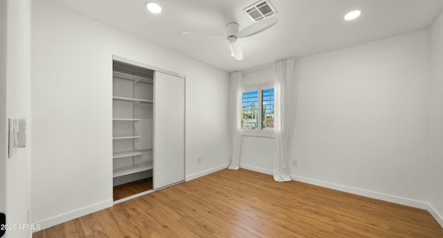 6833 E Grandview Dr, Scottsdale, AZ 85254 - unfurnished bedroom featuring baseboards, recessed lighting, visible vents, ceiling fan, and wood finished floors