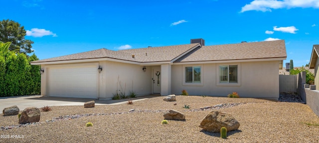 6833 E Grandview Dr, Scottsdale, AZ 85254 - ranch-style home featuring an attached garage, concrete driveway, stucco siding, and fence
