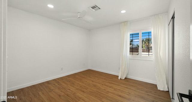6833 E Grandview Dr, Scottsdale, AZ 85254 - unfurnished room featuring recessed lighting, visible vents, baseboards, and wood finished floors