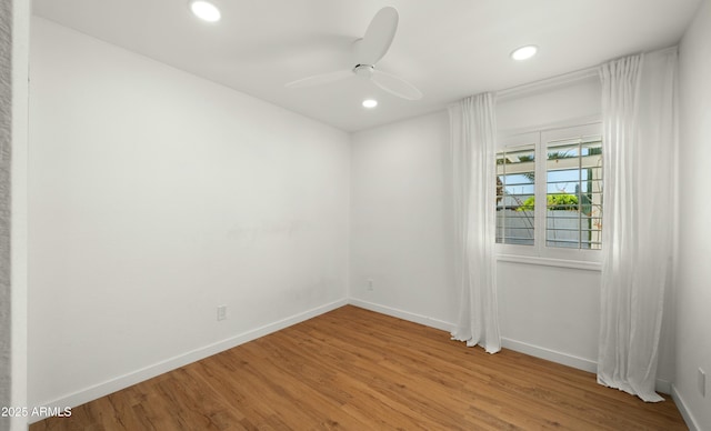 6833 E Grandview Dr, Scottsdale, AZ 85254 - unfurnished room featuring wood finished floors, baseboards, a ceiling fan, and recessed lighting