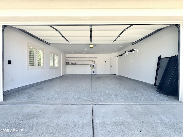 6833 E Grandview Dr, Scottsdale, AZ 85254 - garage with baseboards and water heater