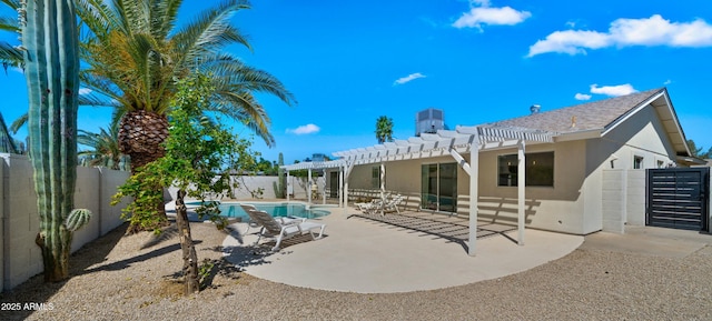 6833 E Grandview Dr, Scottsdale, AZ 85254 - back of property with a pergola, a fenced backyard, a patio, stucco siding, and a fenced in pool