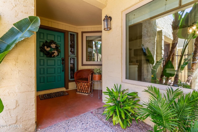 1235 N Sunnyvale Unit 113, Mesa, AZ 85205 - view of exterior entry with stucco siding and covered porch