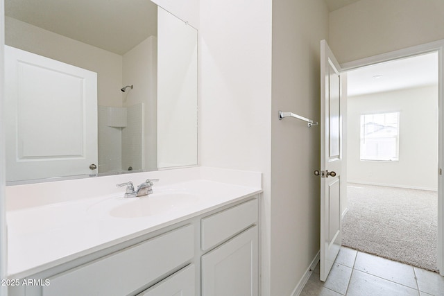 19354 W Coolidge St, Litchfield Park, AZ 85340 - full bathroom featuring a shower, vanity, and baseboards