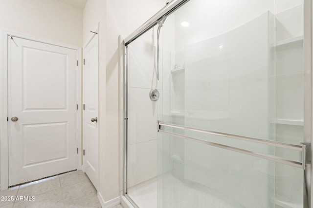 19354 W Coolidge St, Litchfield Park, AZ 85340 - bathroom featuring a stall shower and tile patterned flooring