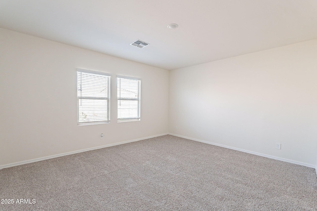 19354 W Coolidge St, Litchfield Park, AZ 85340 - carpeted spare room with visible vents and baseboards