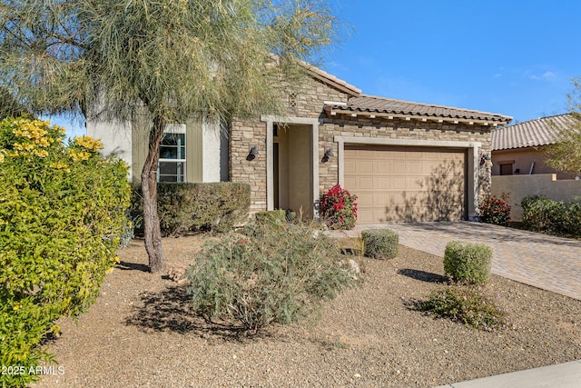 view of front of property featuring a garage