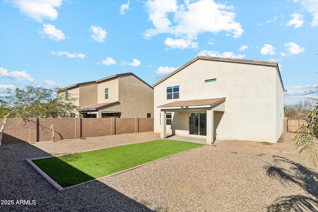 rear view of house with a patio area