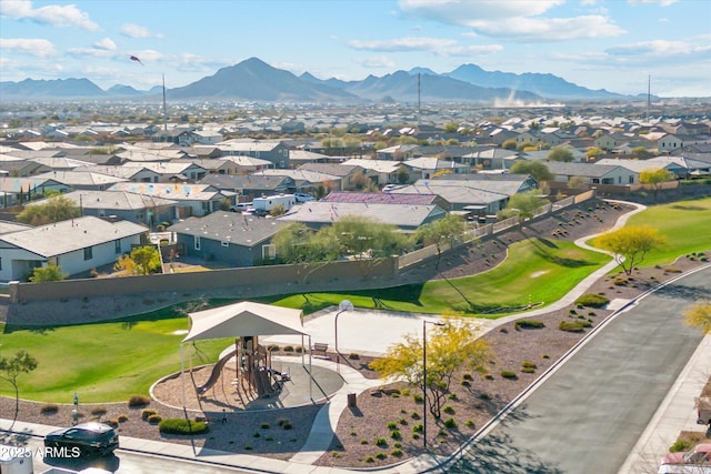 birds eye view of property featuring a mountain view