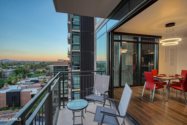 view of balcony at dusk