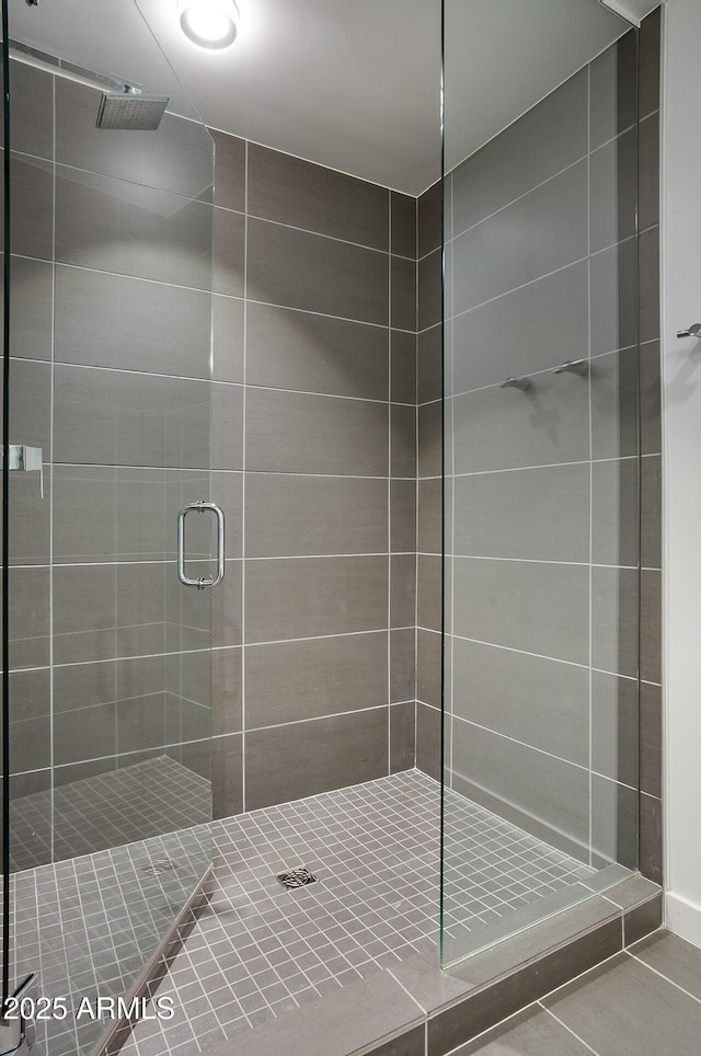 full bathroom with a shower stall