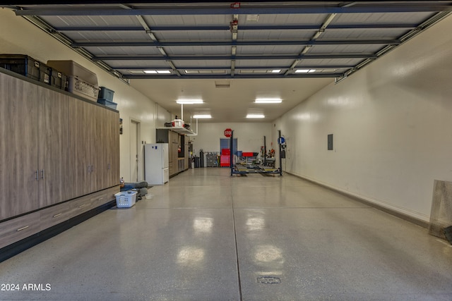 garage featuring white refrigerator