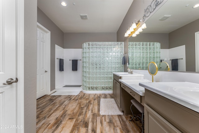 bathroom with hardwood / wood-style floors and vanity