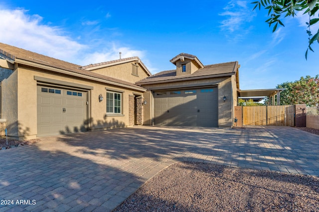 view of front of home with a garage