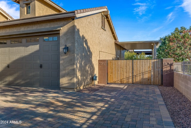 view of property exterior with a garage