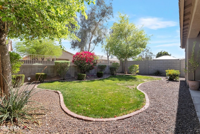 view of yard featuring a fenced backyard