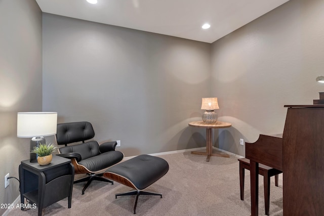 sitting room with recessed lighting, baseboards, and carpet
