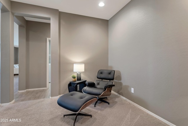 living area featuring carpet floors, recessed lighting, and baseboards