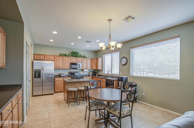 dining area with light tile patterned floors, visible vents, and a notable chandelier