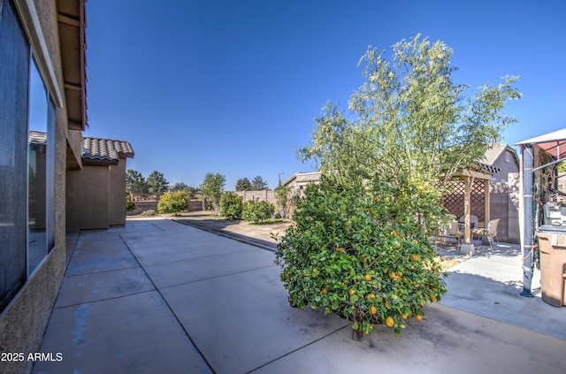 view of patio with fence