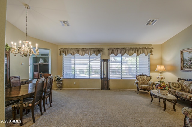 carpeted dining space with baseboards, visible vents, vaulted ceiling, and a chandelier