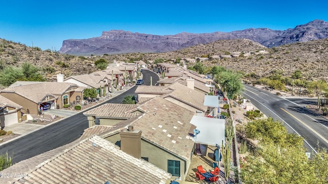 birds eye view of property featuring a mountain view