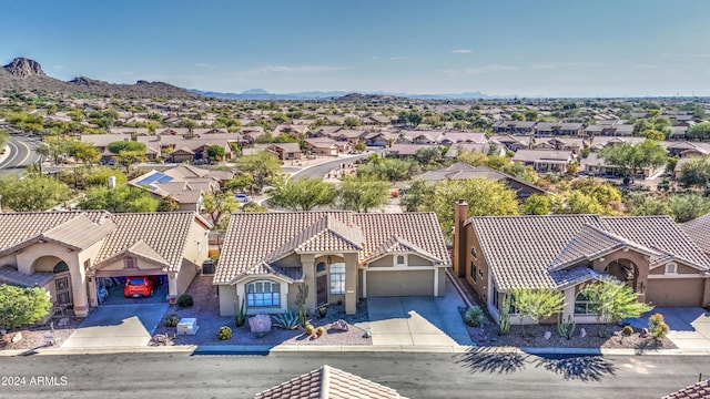 drone / aerial view featuring a mountain view