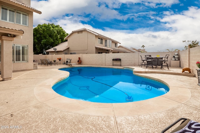 view of pool featuring a patio area