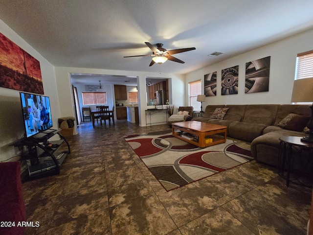 living room with ceiling fan