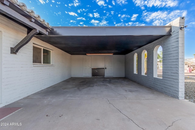 8301 E Crestwood Way, Scottsdale, AZ 85250 - view of parking / parking lot with an attached carport