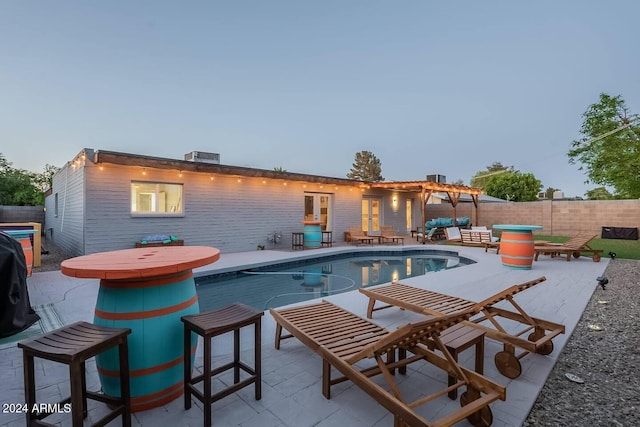 8301 E Crestwood Way, Scottsdale, AZ 85250 - view of pool featuring a patio and an outdoor living space