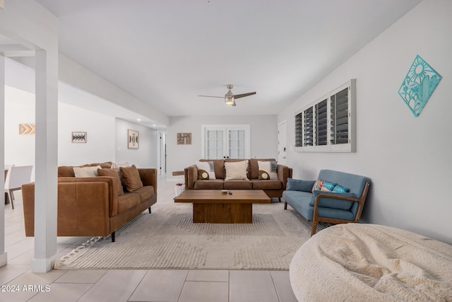 8301 E Crestwood Way, Scottsdale, AZ 85250 - tiled living room featuring a ceiling fan