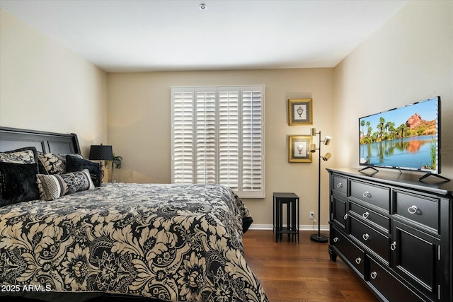 bedroom featuring dark hardwood / wood-style floors