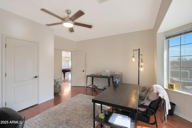 home office featuring ceiling fan and dark hardwood / wood-style floors