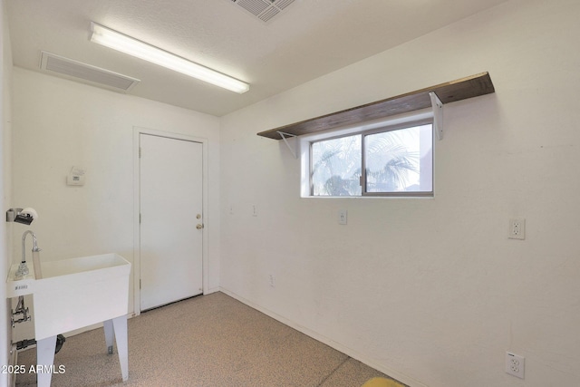 basement featuring sink