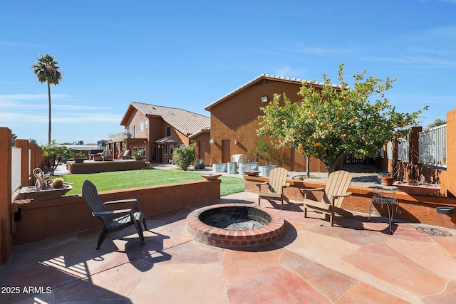 view of patio / terrace featuring a fire pit