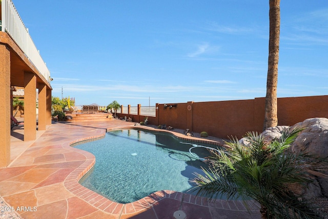 view of pool featuring a patio area