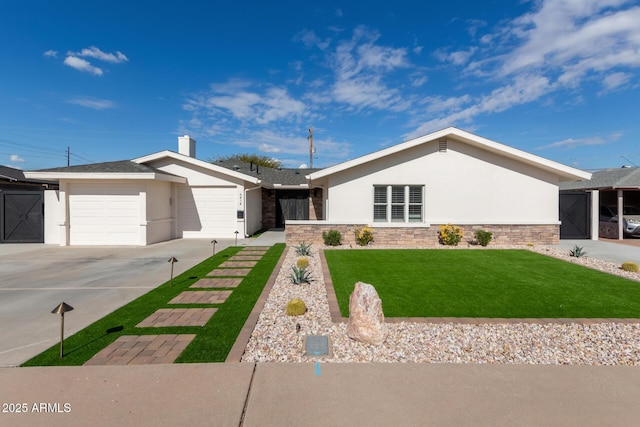 ranch-style home with a garage and a front yard